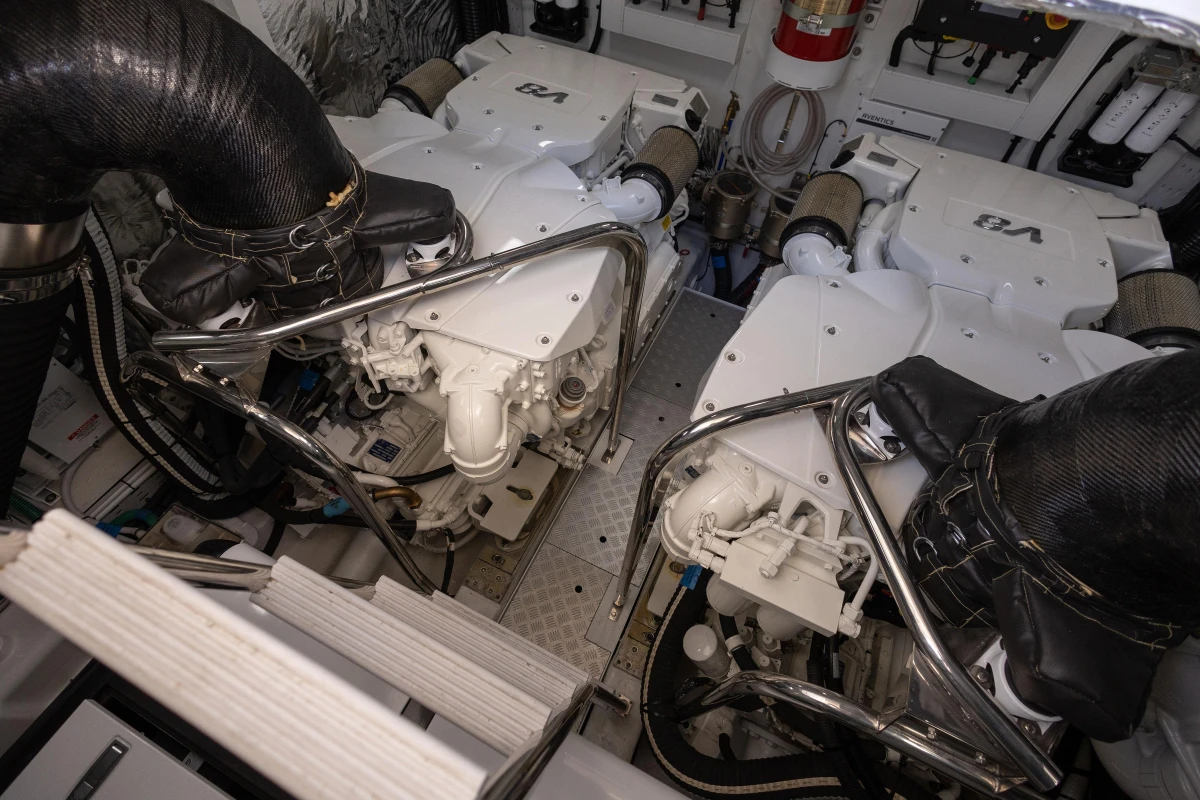 Engine room of 2023 Princess S62 yacht, showcasing dual engines and mechanical components.