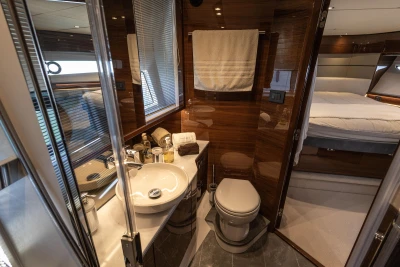 Luxurious bathroom in 2023 Princess S62 yacht with modern amenities and elegant design.