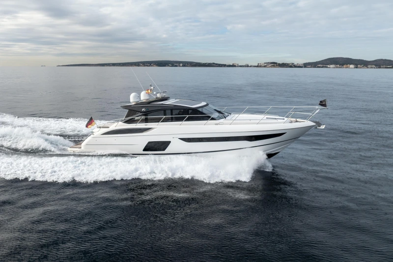 2016 Princess V58 Open yacht cruising on calm waters.