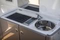 Outdoor kitchen on 2019 Princess V40 yacht with sink and grill.