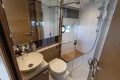 Modern bathroom in 2019 Princess V40 yacht with shower, sink, and toilet.