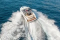 2019 Princess V40 yacht cruising swiftly on open blue sea.