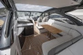 Luxurious 2017 Princess V48 Open yacht interior with elegant seating and wooden table.