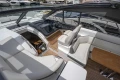 Luxurious 2017 Princess V48 Open yacht interior with sleek seating and modern dashboard.