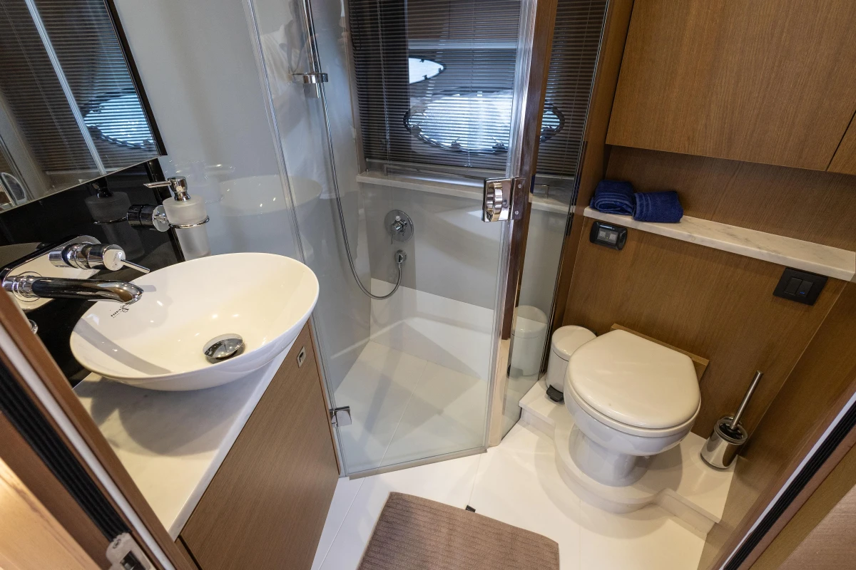 Luxurious bathroom in 2017 Princess V48 Open yacht with modern fixtures and elegant design.