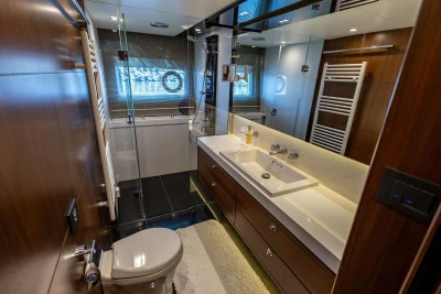 Luxurious bathroom interior of 2014 Princess S72 yacht, featuring modern fixtures and elegant design.