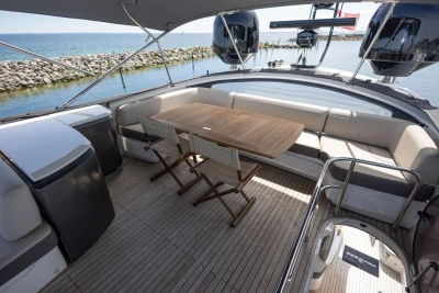 Luxurious 2014 Princess S72 yacht deck with seating and ocean view.