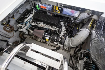 Engine room of a 2014 Princess S72 yacht, showcasing detailed mechanical components.