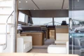 Luxurious interior of a 2014 Princess 56 yacht with modern furnishings and elegant design.