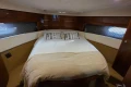 Luxurious bedroom interior of 2006 Princess 42 Flybridge Motor Yacht.