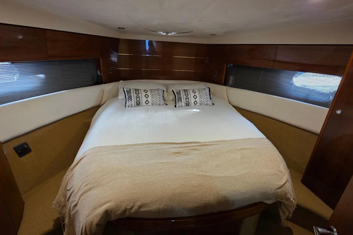 Luxurious bedroom interior of 2006 Princess 42 Flybridge Motor Yacht.