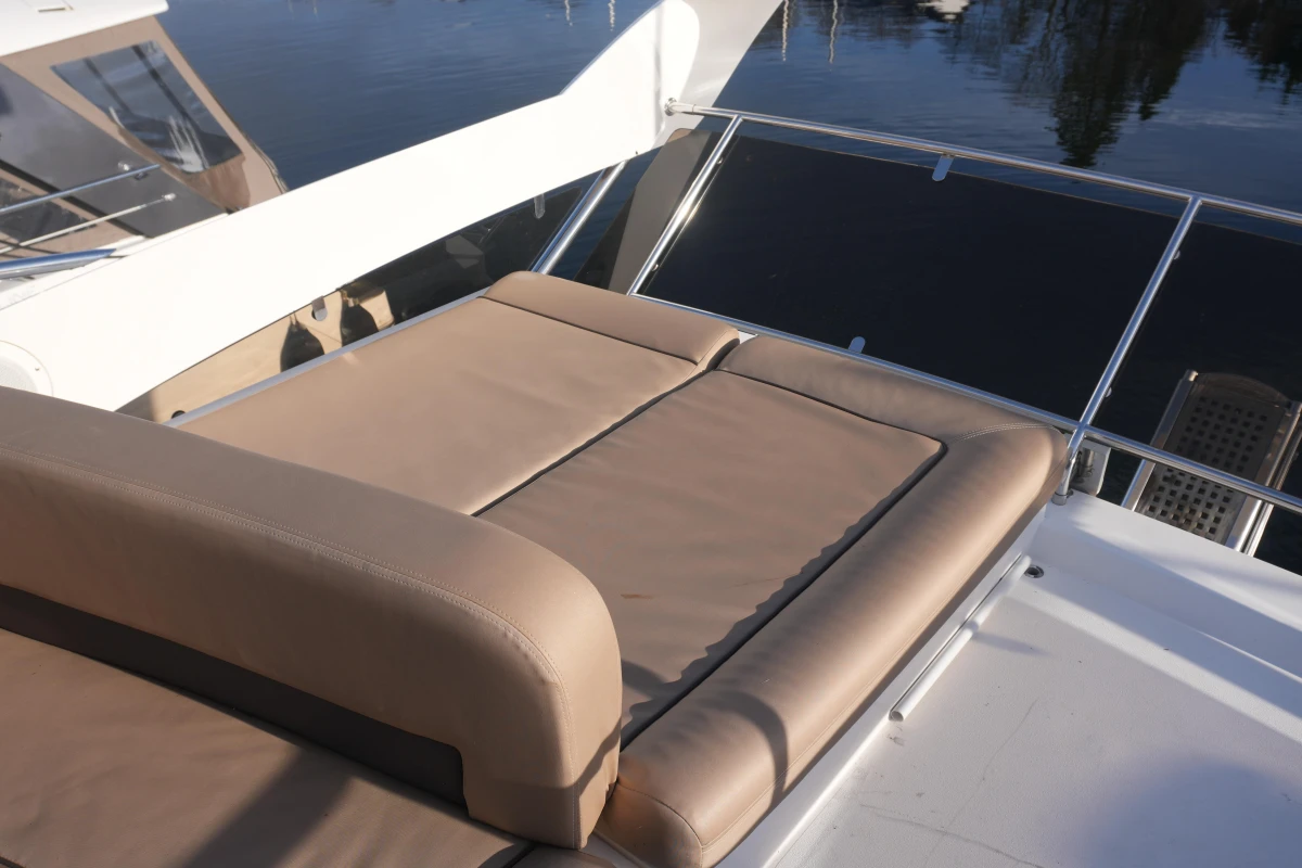 Luxurious seating on 2006 Princess 42 Flybridge Motor Yacht, overlooking serene waters.