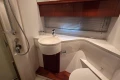 Luxurious bathroom in 2006 Princess 42 Flybridge Motor Yacht with modern fixtures.