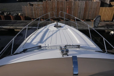 2006 Princess 42 Flybridge Motor Yacht bow view at dock.