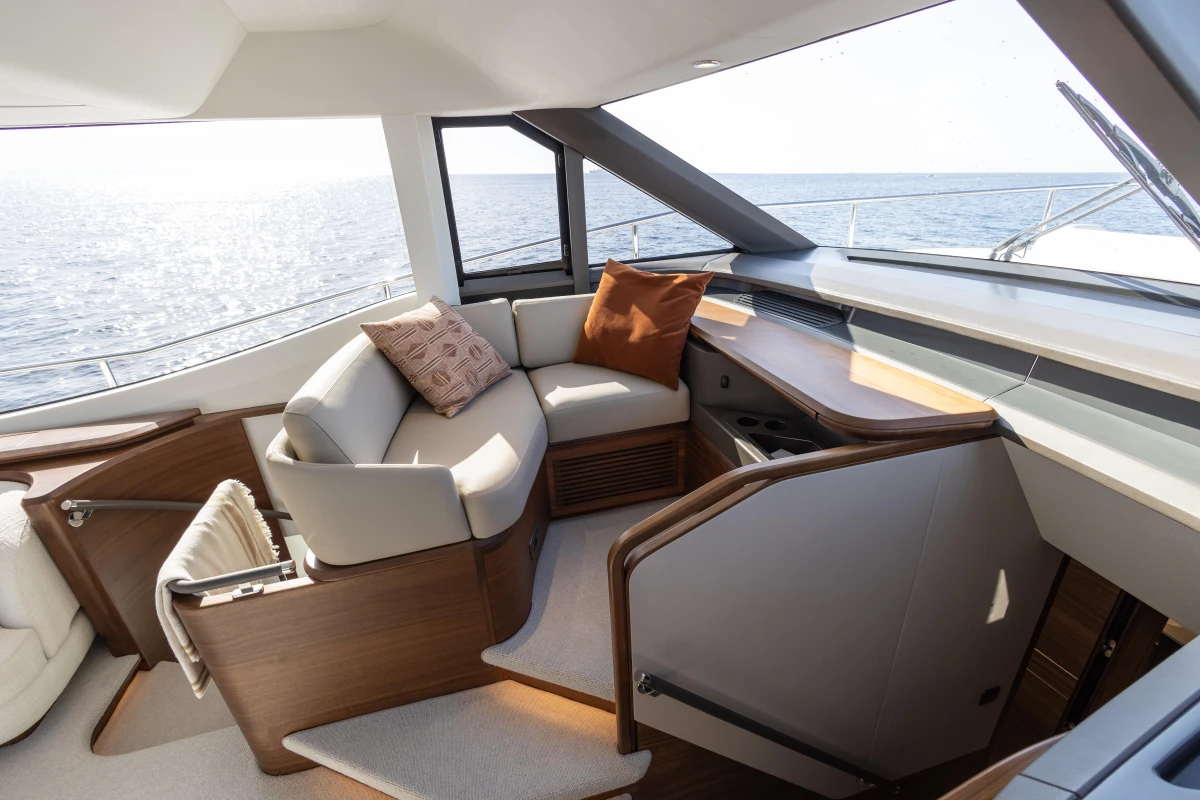 Luxurious interior of 2026 Princess Y72 yacht with elegant seating and ocean view.
