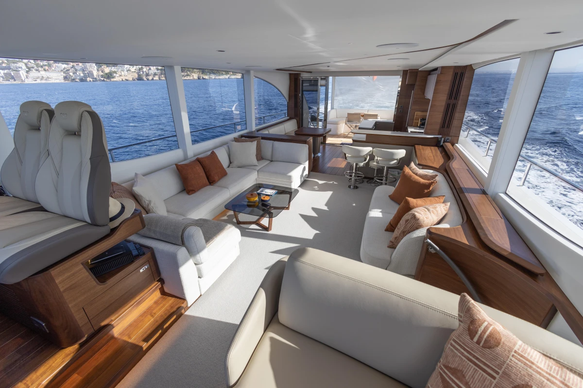 Luxurious interior of 2026 Princess Y72 yacht with elegant seating and ocean view.