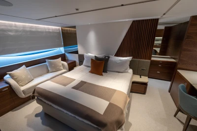 Luxurious bedroom interior of 2026 Princess Y72 yacht, featuring elegant design and modern furnishings.
