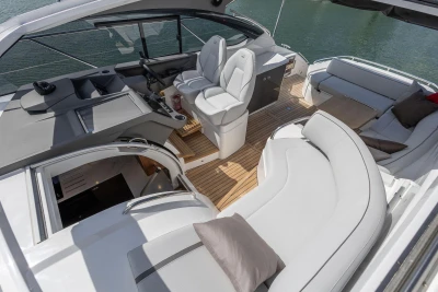 Luxurious 2026 Princess V40 yacht interior with elegant seating and modern helm.