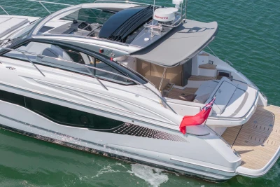 Luxurious 2026 Princess V40 yacht cruising on open water, featuring sleek design and modern amenities.