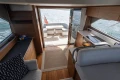 Luxurious interior of 2023 Princess F50 yacht with modern kitchen and ocean view.