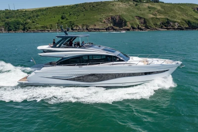 Luxury yacht Princess S72 2023 cruising on open sea.