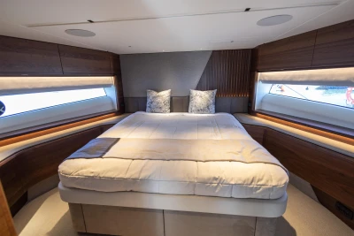 Luxurious bedroom on the 2023 Princess S72 yacht.