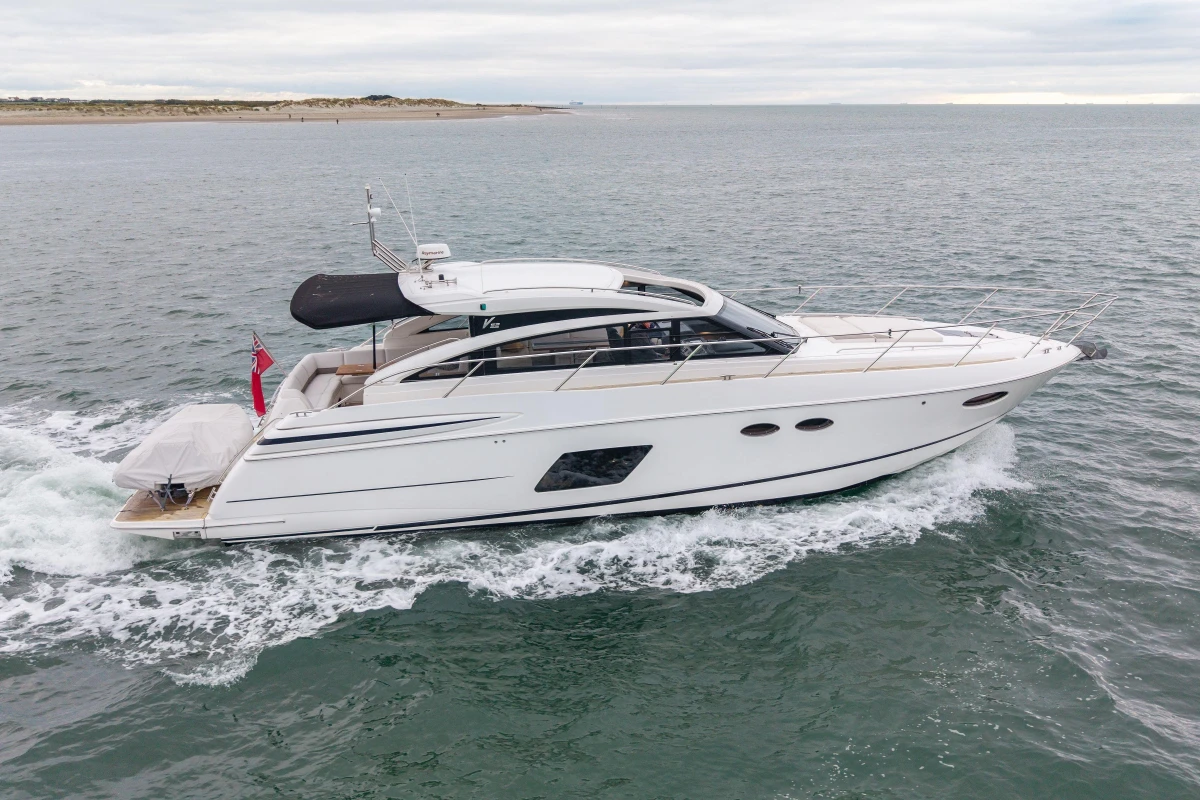 2014 Princess V52 yacht cruising on open water.
