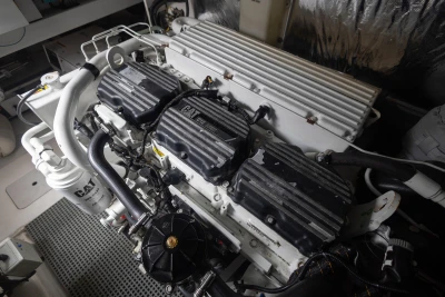 Engine room of a 2012 Princess V52 yacht, featuring a CAT marine engine.