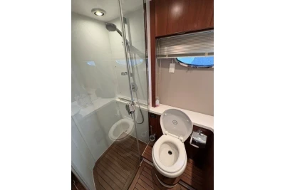 Bathroom interior of 2013 Princess V52 yacht with shower and toilet.