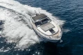 2017 Princess V40 yacht cruising on open water, creating a dynamic wake.