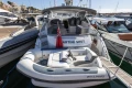 2017 Princess V40 yacht with inflatable boat, docked in a marina.