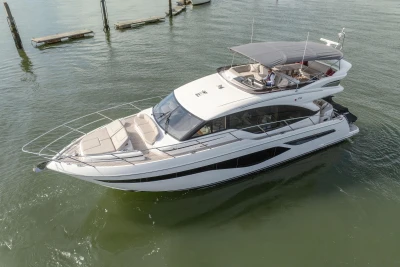 The 2022 Princess F55 is a sleek motor yacht with a modern design and spacious deck.