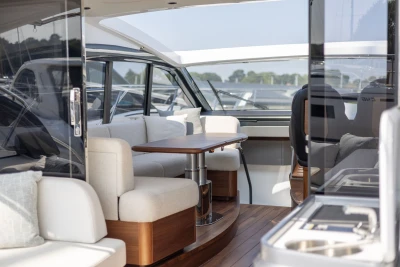 Luxurious interior of 2026 Princess V50 yacht with elegant seating and modern design.