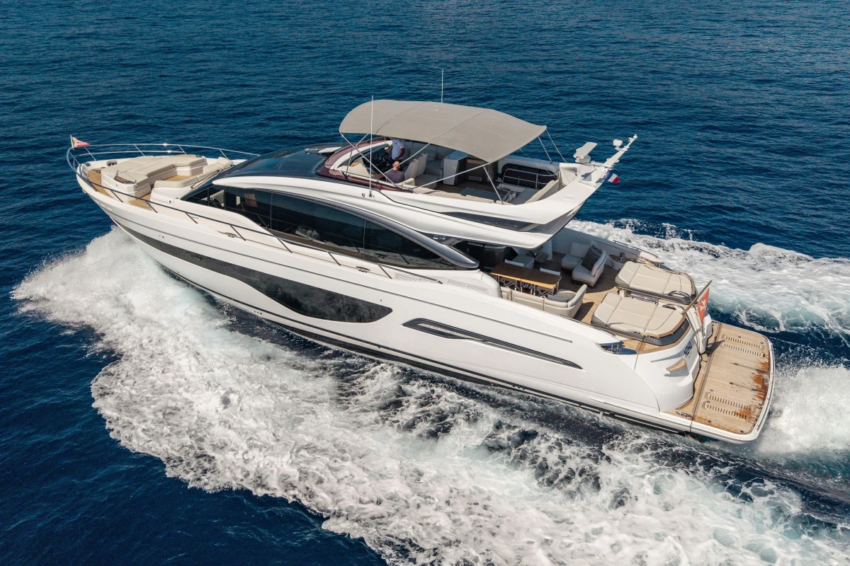 Luxury 2022 Princess S78 yacht cruising on open sea.
