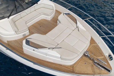 Luxurious 2022 Princess S78 yacht deck with elegant seating and teak flooring.