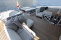 Luxurious 2022 Princess S78 yacht deck with elegant seating and scenic ocean view.