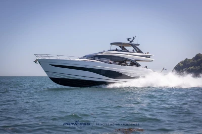 2023 Princess S72 yacht cruising on open water, showcasing sleek design and luxury.