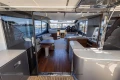 Luxurious interior of 2023 Princess S72 yacht with modern design and spacious seating.