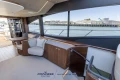 Luxurious interior of 2023 Princess S72 yacht with waterfront view.