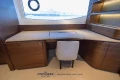 Luxurious interior of 2023 Princess S72 yacht with elegant wood finish and modern design.