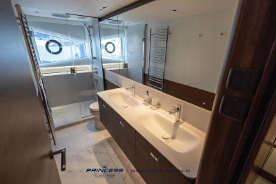 Luxurious bathroom in 2023 Princess S72 yacht with dual sinks and modern fixtures.