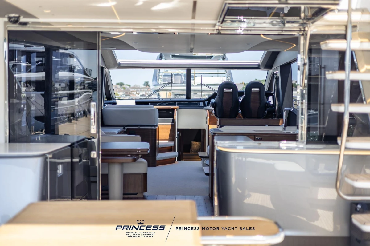 Luxurious interior of 2023 Princess S72 yacht with modern design and elegant furnishings.
