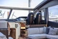 Interior of 2023 Princess S72 yacht with modern seating and sleek design.