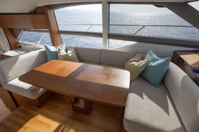 Luxurious 2019 Princess F50 yacht interior with elegant seating and ocean view.
