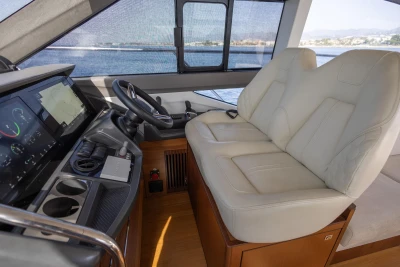 2019 Princess F50 yacht interior with leather seating and modern control panel.