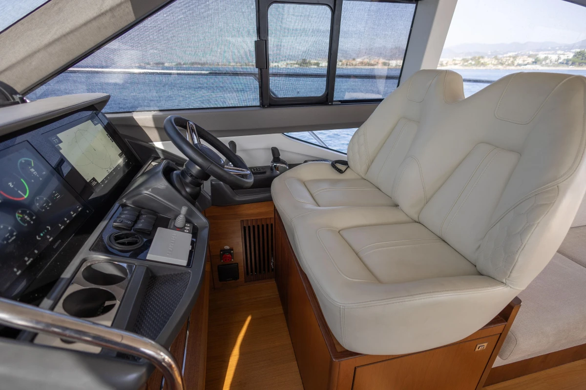 2019 Princess F50 yacht interior with leather seating and modern control panel.