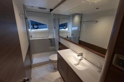Luxurious bathroom in 2026 Princess F65 yacht with modern fixtures and elegant design.
