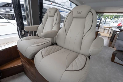 Luxurious leather seats inside a 2026 Princess F65 yacht, showcasing elegant design and comfort.