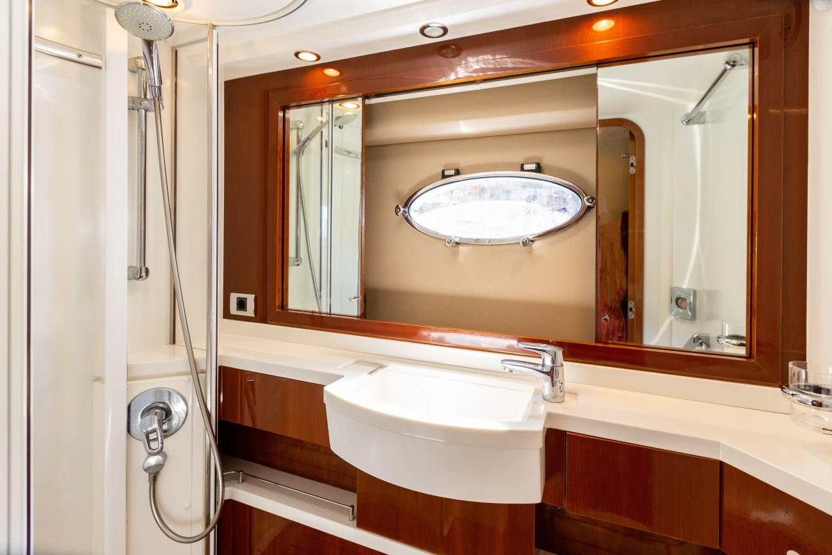 Luxurious bathroom in 2008 Princess 58 yacht with modern fixtures and elegant design.