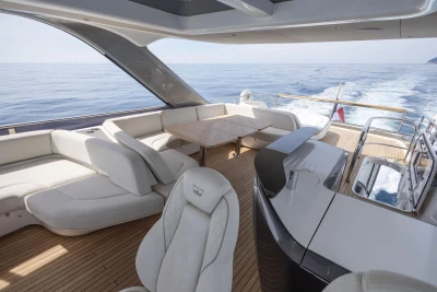 Luxurious 2021 Princess Y72 yacht interior with elegant seating and ocean view.